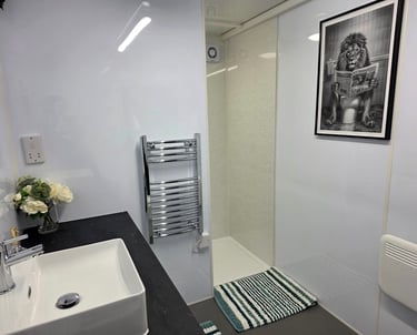 Interior of a fully equipped temporary bathroom pod provided during insurance claims and home renovation projects.