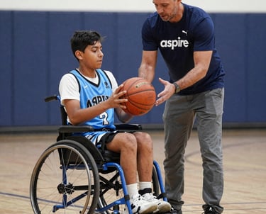 A group of kids with adaptive sports equipment enjoying a game outdoors.