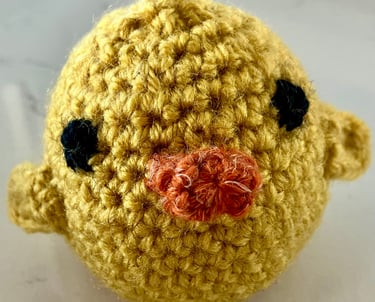 Yellow handmade crocheted chick