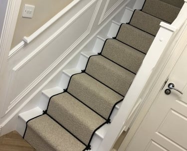 Blackpool carpet fitted on a white staircase