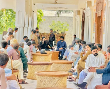 Saqib Khan Chadhar at his residence to solve community problems in his local area chiniot