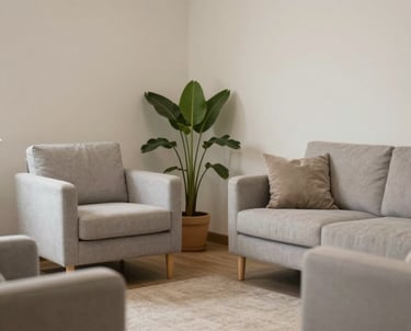 A calm therapy room with soft lighting and comfortable chairs.