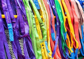 round synthetic slings being inspected