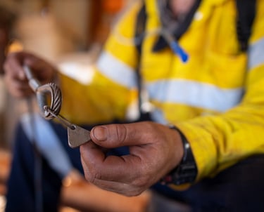 rigging inspection by technician on mine site