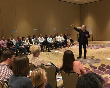 Mike Allison presenting to a group of managers from Johnson & Johnson Vision