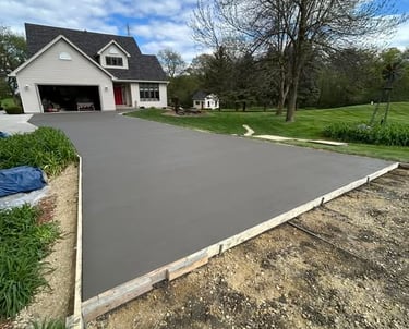 Professional concrete driveway installation.