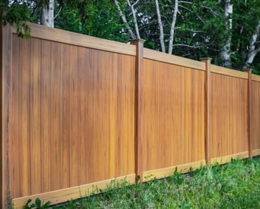Seamless horizontal wood privacy fence installation with solid post construction.