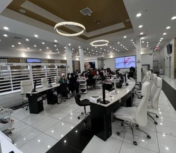 a high end nail salon with a large display of beauty products