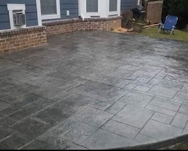 a patio with a patio with a concrete patio with a concrete patio with a concrete