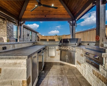 a kitchen with a ceiling fan and a ceiling fan