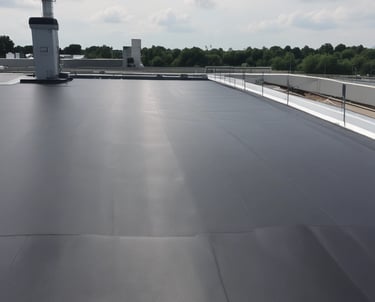 Technician installing a sleek, energy-efficient HVAC unit in a modern New York City apartment.