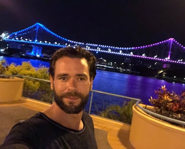 a man taking a selfie with a camera after playing golf in australia