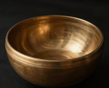 A serene sound bath scene with gentle light rays illuminating a calm space.