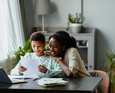 Happy mother after reading the chimhanda tutoring guide on how to help your child