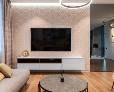 a living room with a television and a couch