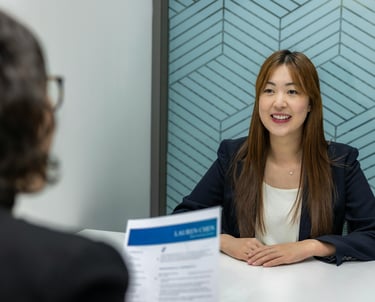 Female recruiter conducting interview at a business meeting