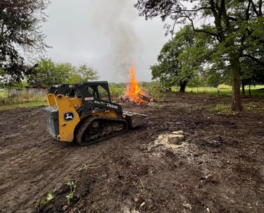 skid-steer-clearing-land-in-hannibal-mo