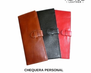 a set of three leather notebooks with a leather cover