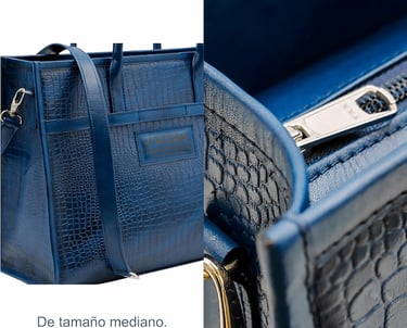 a blue purse with a gold chain and a gold chain