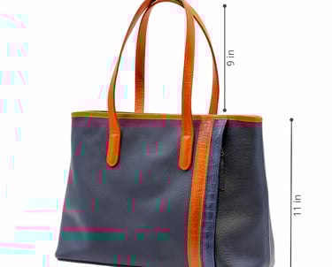 a handbag with a blue and orange leather tote bag