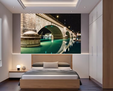 a bedroom with a bed and a large painting on the wall
