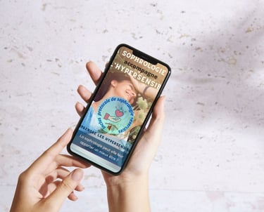 a person holding a cell phone in their hand