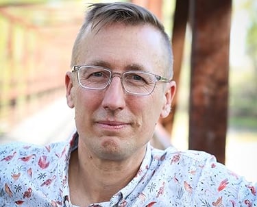 a headshot of co-founder david shurna