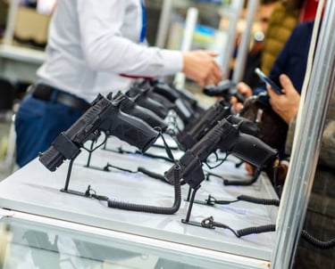 gun show display and helping customers
