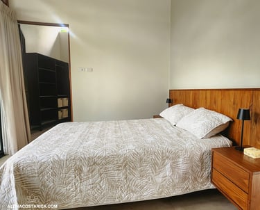 a bed with a private bathroom