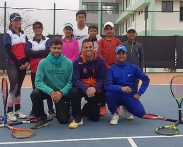 Coach Cesar with Player from the Nepal Tennis Federation