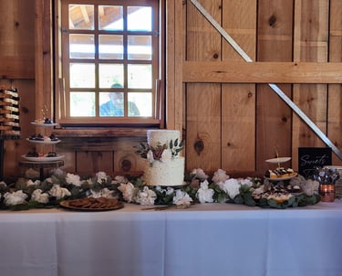 a table with a cake and a knife on it