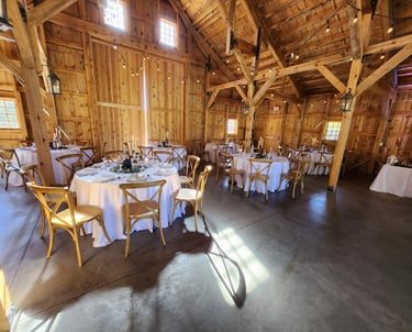 a large room with tables and chairs and a table