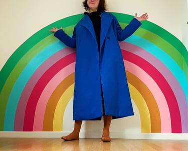 Fresque d'arc-en-ciel peint par artiste-peintre dans une chambre de bébé dans le Calvados en Normandie entre Caen et Rouen