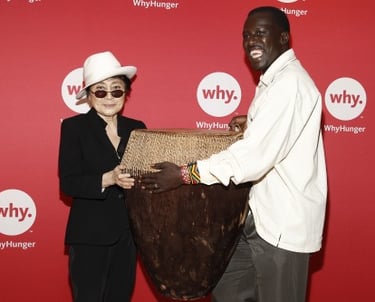 Hope North Founder Okello Sam with Yoko Ono.
