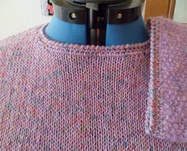 Haut de pull et bas de manche mauve fait au crochet