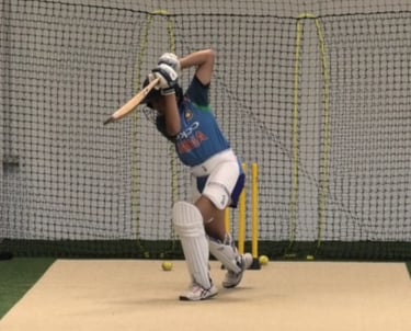 Player undertaking high performance batting coaching
