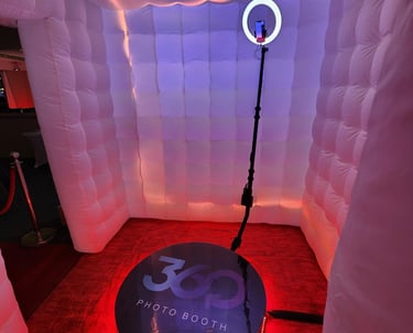 360 Photo Booth with light ring and led lighting around base.