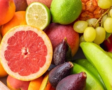a bunch of fruit and vegetables in a basket