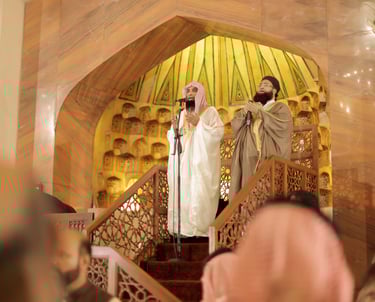 a man and woman singing into a microphone