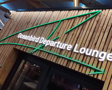 Completed signage installation at Oceanbird Departure Lounge – example of certified, high-compliance