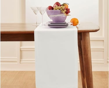 Simple white table runner for minimalist dining room table styling
