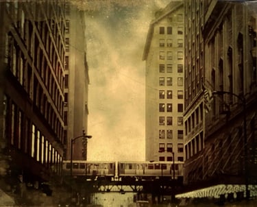An old fashioned city street in Chicago, showcasing a train on its tracks