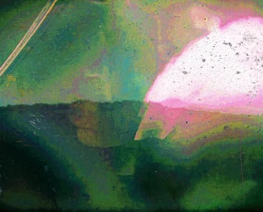 Abstract photograph of sun path in green and purple