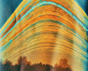 A vibrant painting of a six-month sun trail effect on photo paper.