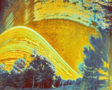 A vibrant painting of a six-month sun trail effect on photo paper.