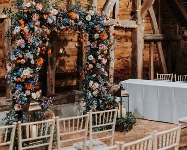 Fairy-lit wooden barn at Gildings Barns in Dorking, Surrey, wedding venue