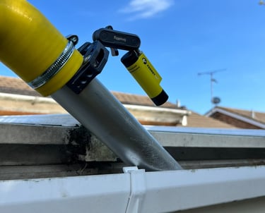 Vac gutter cleaning with an inspection camera