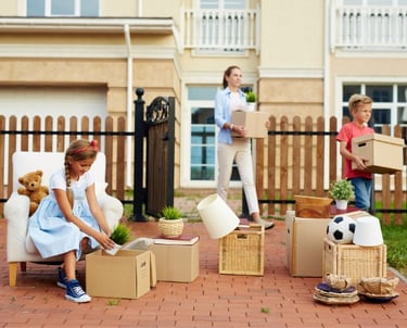 family moving out carrying boxes before end of tenancy carpet cleaning