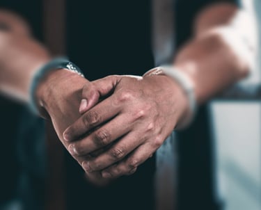 hands with handcuffs
