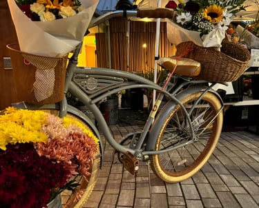 hand-created flower bouquets staged on a bike for a chic bohemian vibe